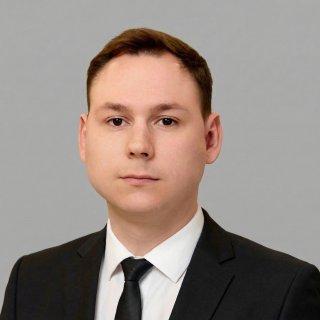 Денис Коняев